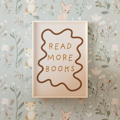 Wooden sign with 'Read More Books' text on a floral and animal wallpaper background