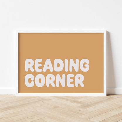 Framed sign with 'READING CORNER' text on a beige background