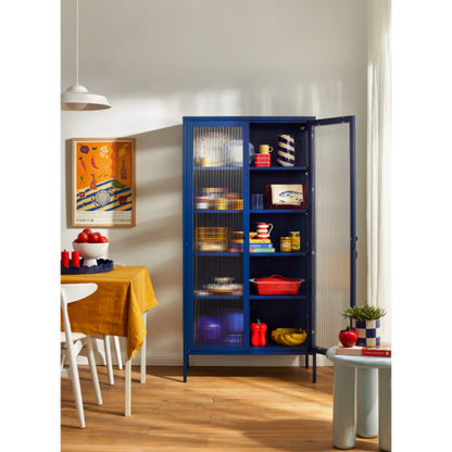 Navy blue cabinet with glass panel in a dining room