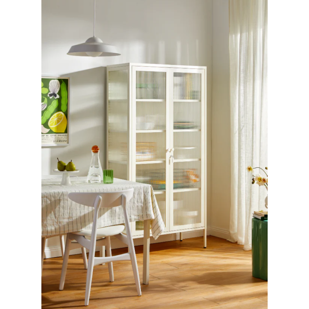 Chalk cabinet with glass panels in a dining room