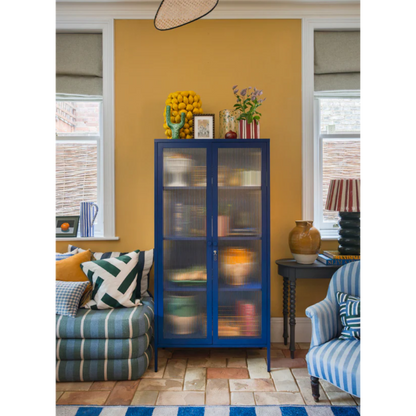 Blue cabinet in a living room environment