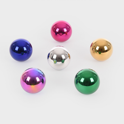 Set of colourful metallic balls on a white background