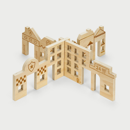 Wooden toy building blocks on a white background