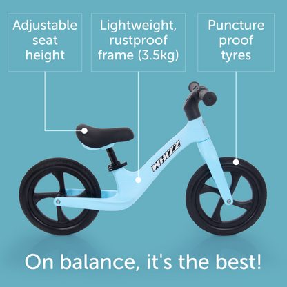 Light blue balance bike with features highlighted on a blue background