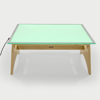 light panel on stand glowing green