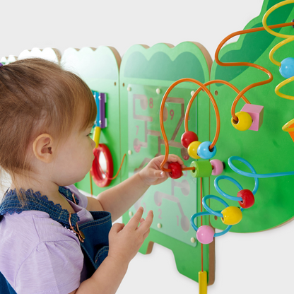 Child playing with a colourful educational toy