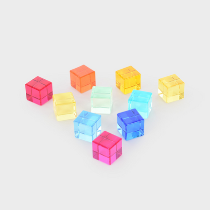 Colorful transparent cube-shaped objects on a white background