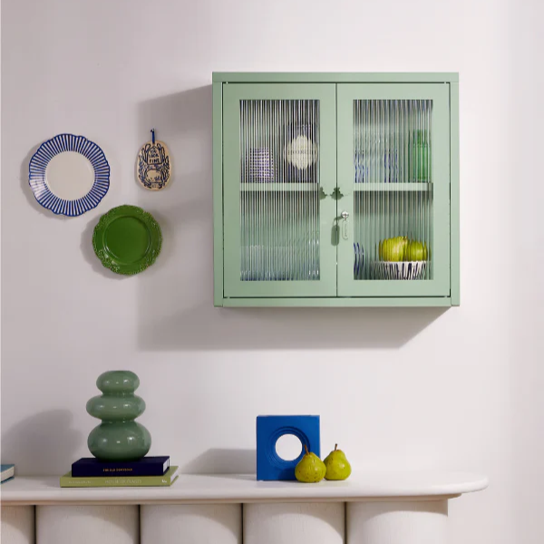 Glass cabinet in a green sage colour