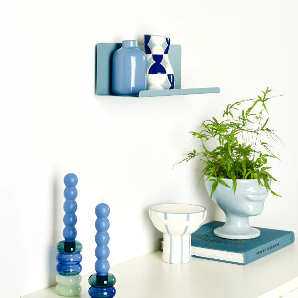 Light blue shelf and decor