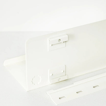 White metal bracket on a white background