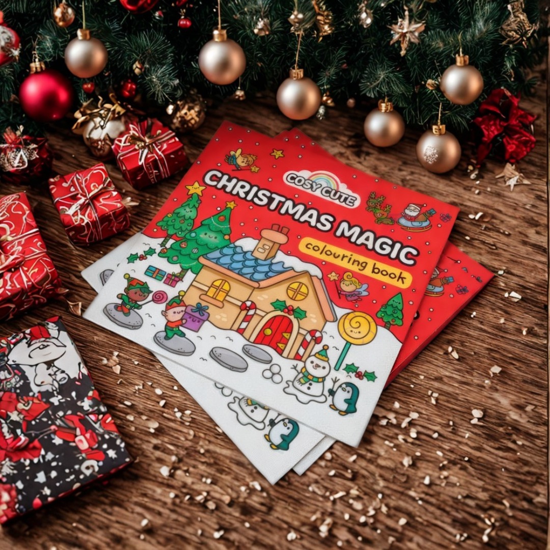 Christmas-themed coloring book with festive decorations on a wooden surface